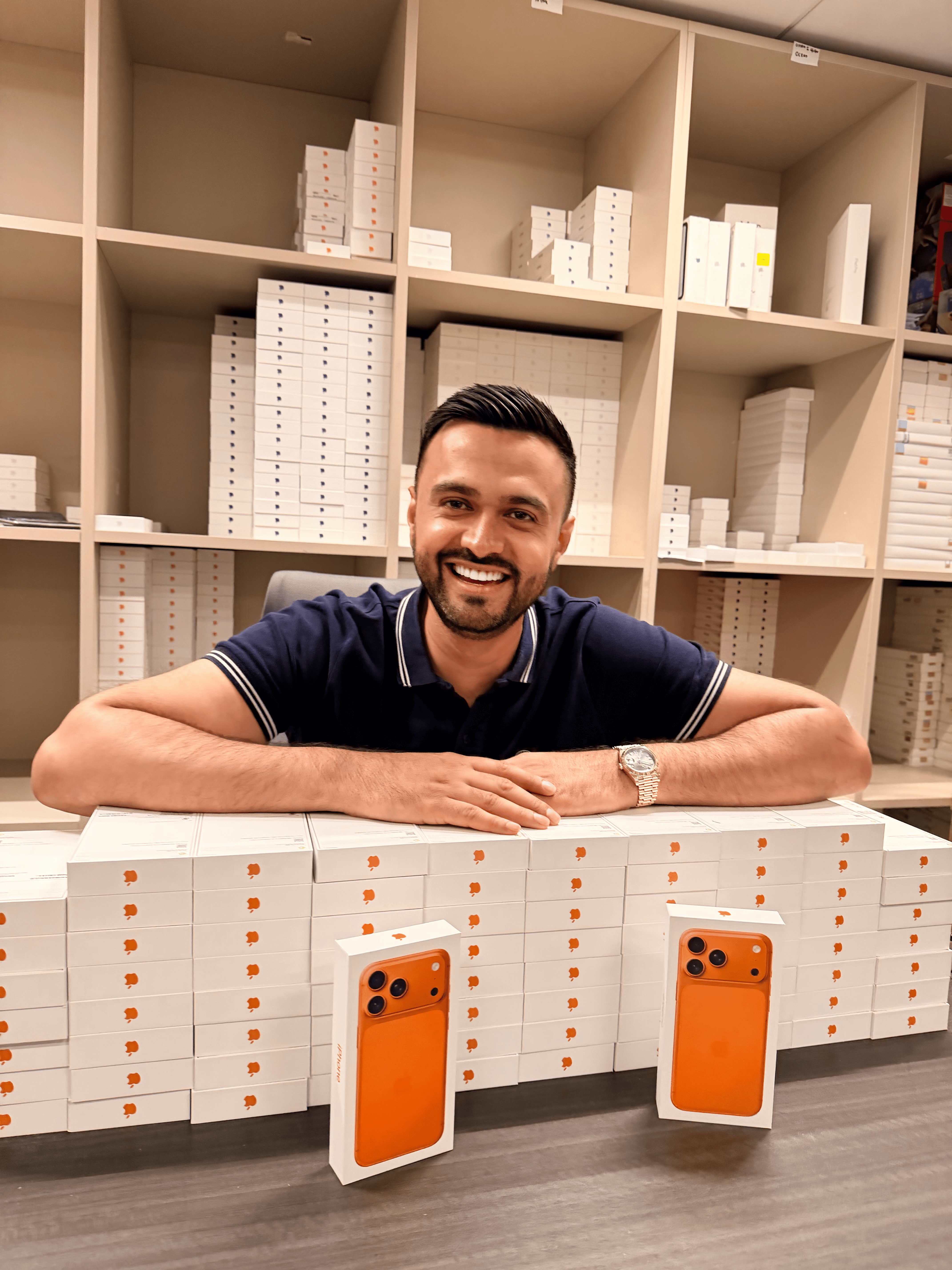 Coolmix team showcasing boxed devices